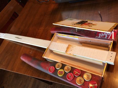 how to make an electric cigar box guitar|build a cigar box guitar.